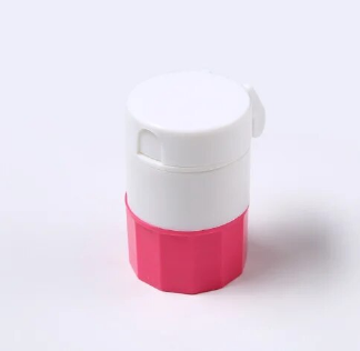 Pillendoosje en pillensnijder; Roze/wit